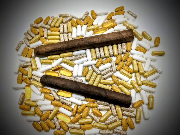Cigars with vitamin supplement pills and tablets