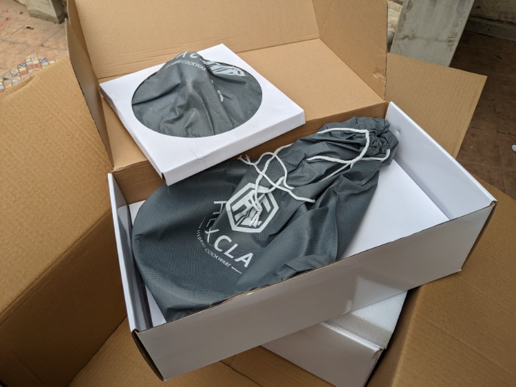 Hexclad Pans With Dust Covers In Shipping Boxes