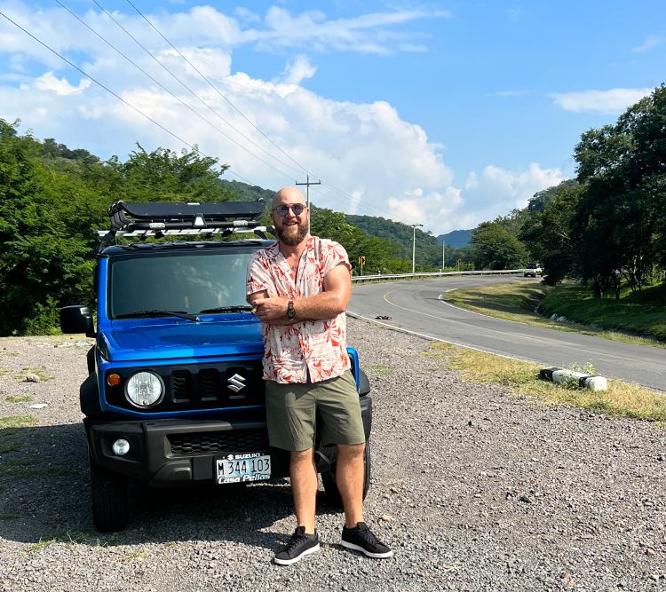 Paul Anthony In Front of Jimny In Nica