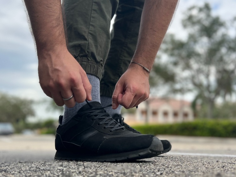 Tying Graham Trainers On Feet