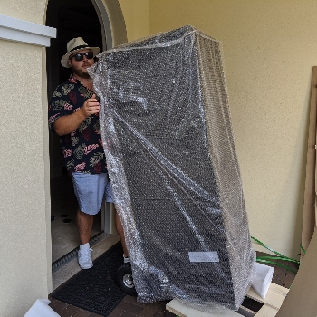 Paul Hauling New Remington Cigar Cabinet