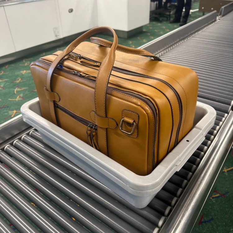 Cravar Daytrip CO Duffle Bag In TSA Tray Airport