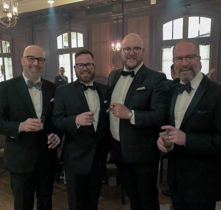 Men In Tuxedos Smoking Cigars